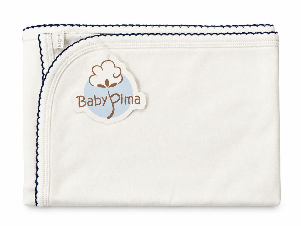 White blanket with navy trim