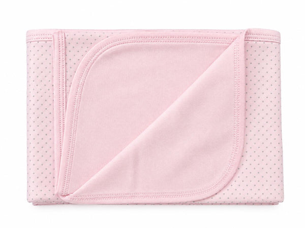 Pink blanket with grey dots
