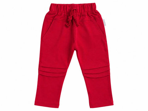 Red pants with knee pleats